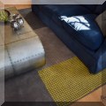 DR03. Gray multi colored rug. Measures approx. 9'x6' 